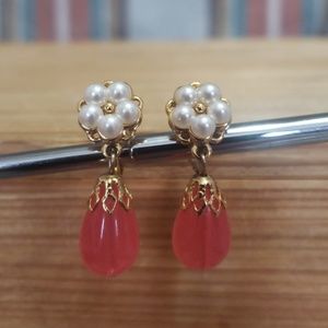 Vintage Trifari, faux pearl, and lucite, clip